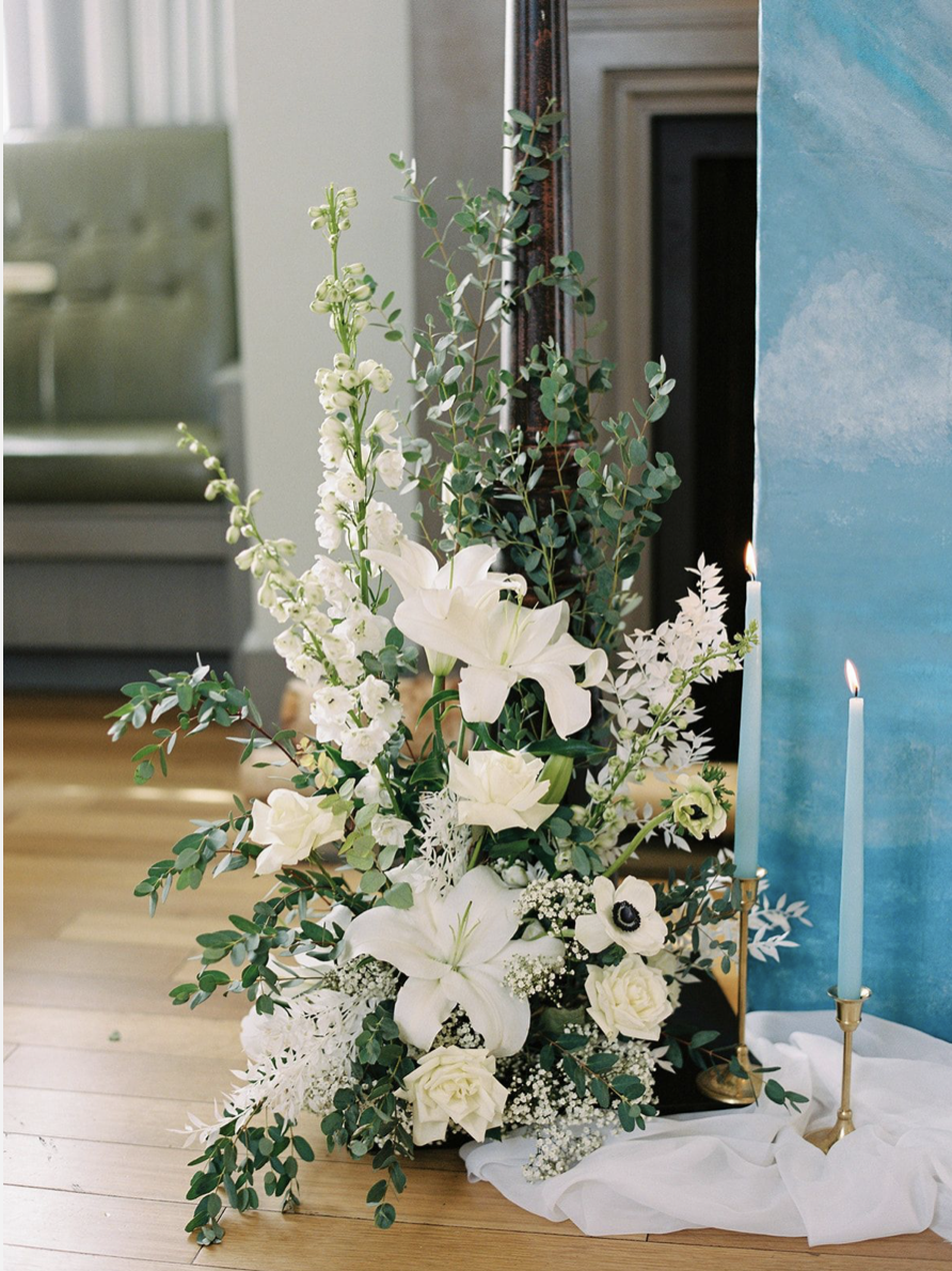 whimsical-wedding-ceremony-floral-arrangement.png