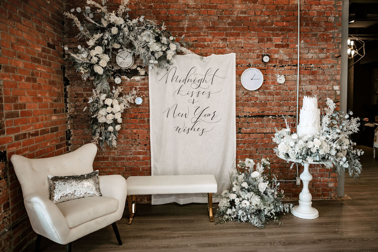 wedding decor florals hand written banner photo area.jpg